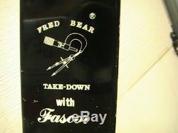 Bear C riser takedown, with premium bear sight. And two 1984 olympic arrows