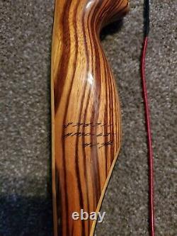 Fred Bear Tigercat Recurve 62 42# draw weight in very good condition new string