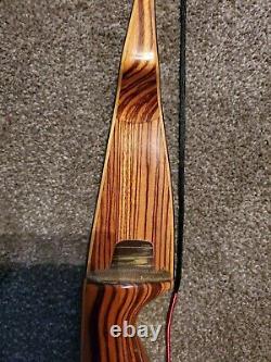 Fred Bear Tigercat Recurve 62 42# draw weight in very good condition new string
