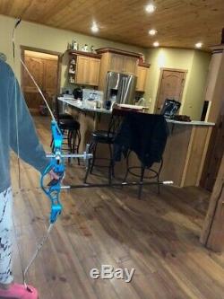 Gently Used Hoyt Grand Prix Metallic Blue riser, limbs, case and accessories